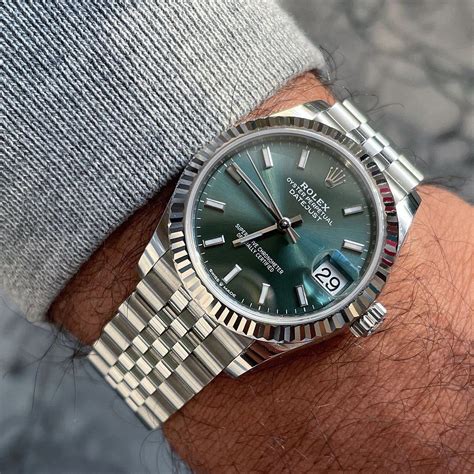 rolex green on wrist|Rolex green.